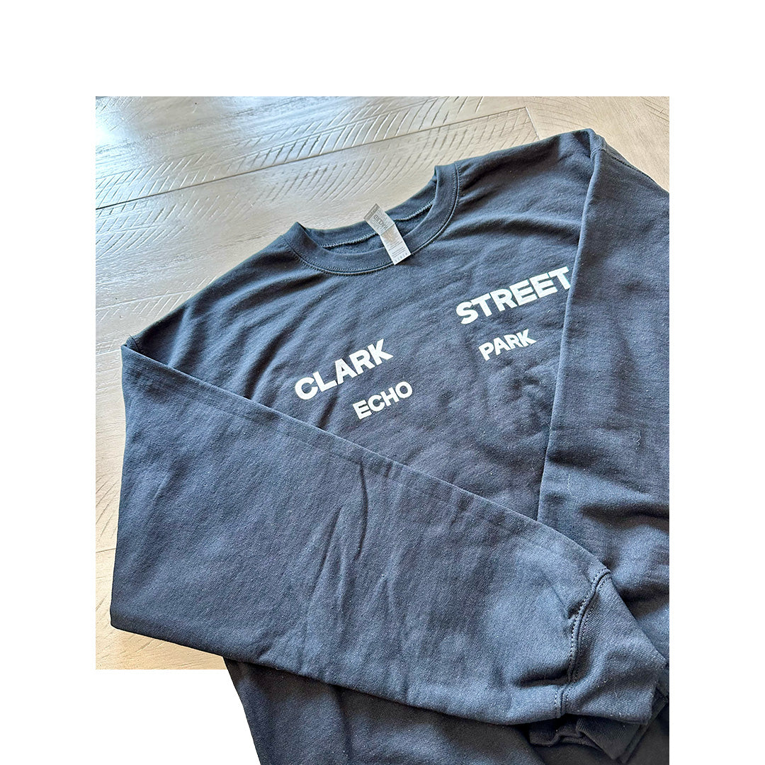 Black Gildan sweatshirt with white “Clark Street Echo Park” logo on the front