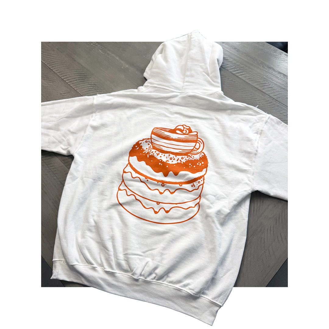 Independent Trading Co. heavyweight white hoodie with stacked pancake and coffee cup graphic printed in orange on back.