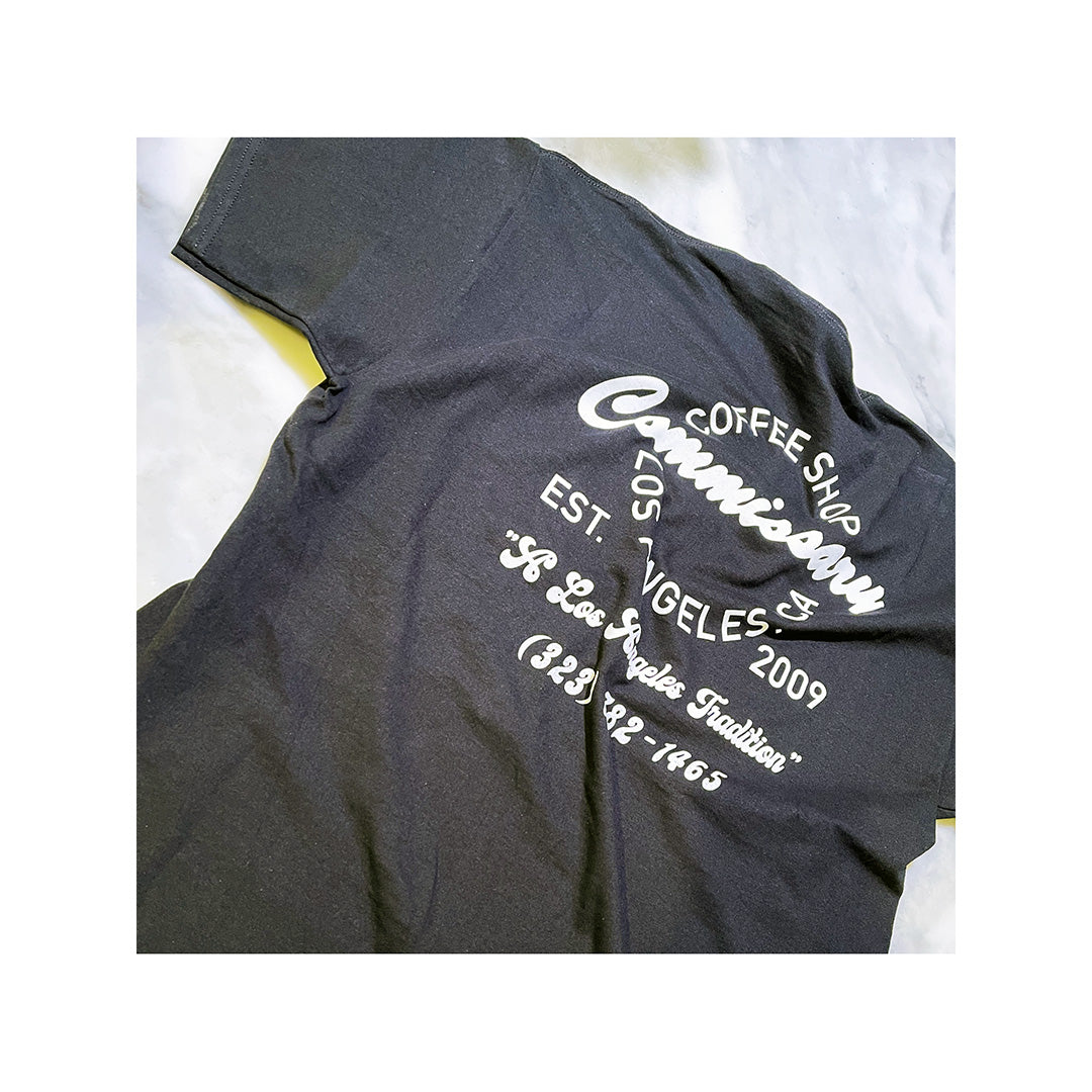 Black Gildan 2000 T-shirt with bold white circular back print design for Commissary coffee shop