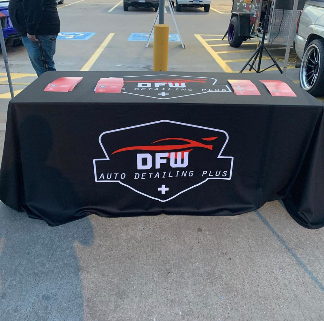 Custom black table throw featuring a bold logo design for DFW Auto Detailing Plus, perfect for car shows and pop-up booths