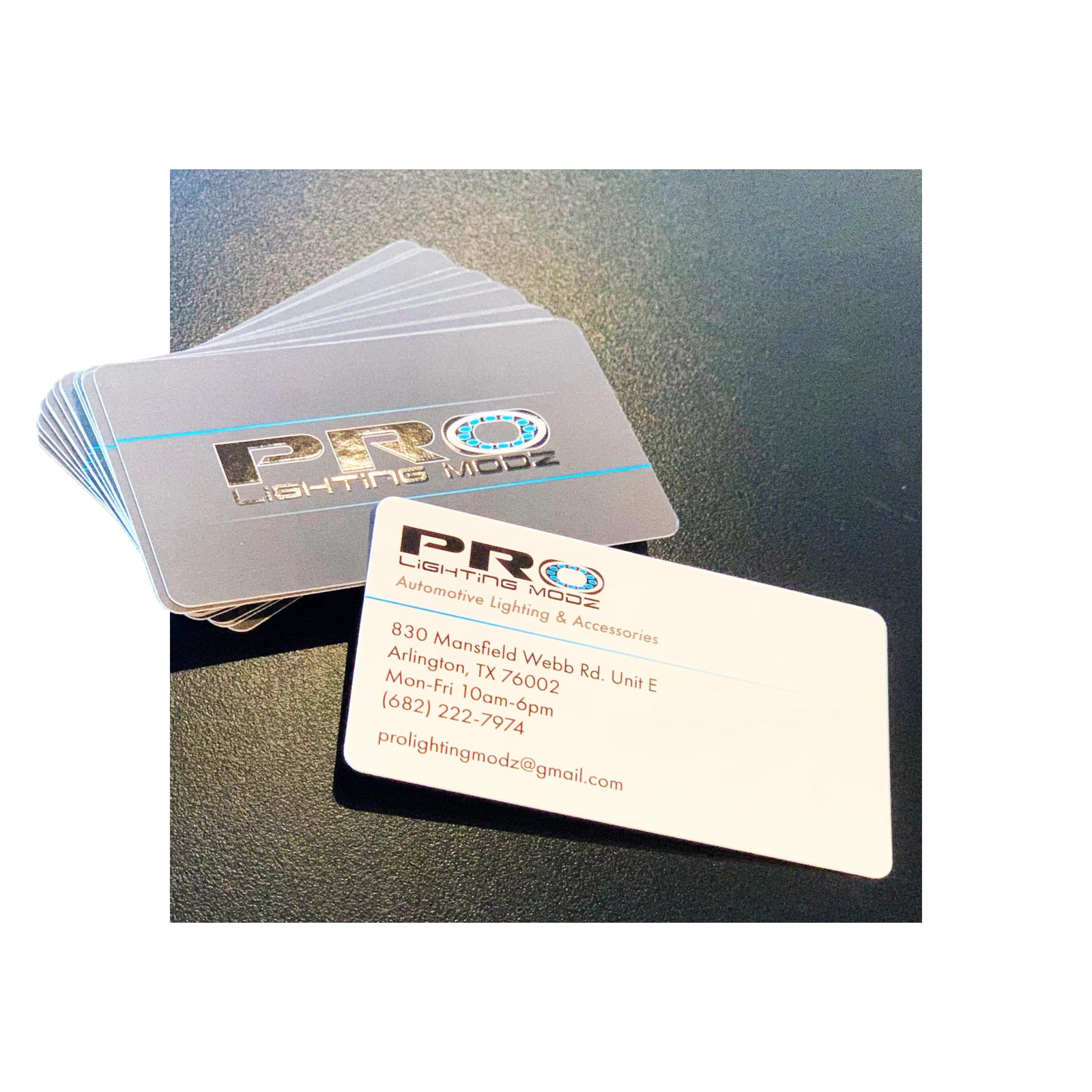 Glossy suede business cards for Pro Lighting Modz with metallic spot gloss logo and automotive branding