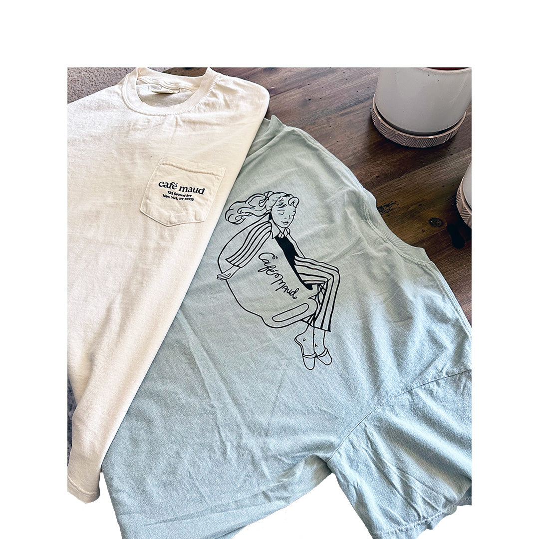 Comfort Colors shirts printed front and back with Café Maud branding – artistic line illustration