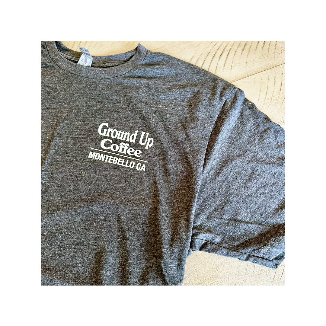 Next Level 6010 triblend charcoal heather T-shirt with Ground Up Coffee Montebello CA logo printed on front chest.