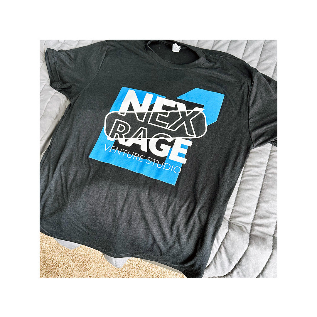 Next Level 6010 triblend black T-shirt with Nex Rage Venture Studio logo printed in blue and white on front.