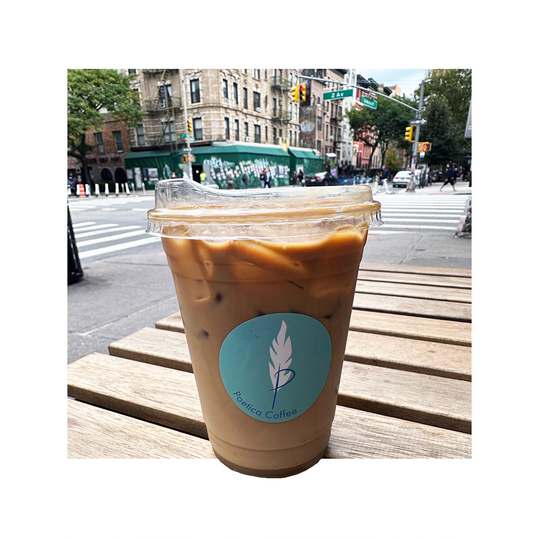 Custom circle label for Poetica Coffee on plastic iced coffee cup, printed with teal background and white logo