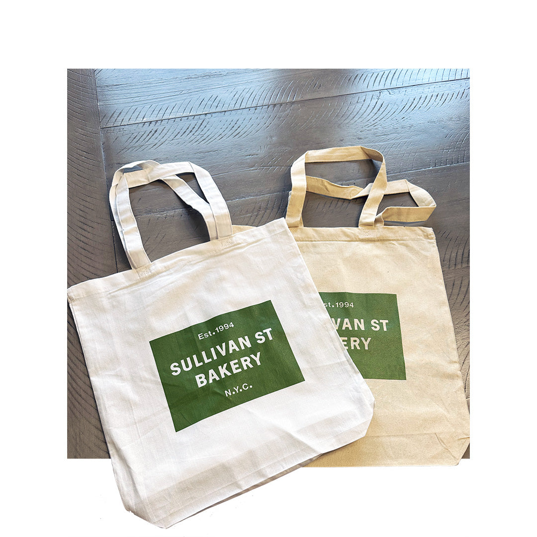 Pair of Sullivan St Bakery canvas tote bags with forest green rectangular print